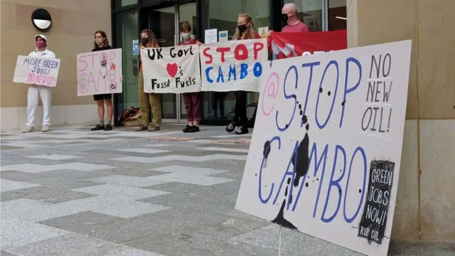 Climate change protestors oppose the development of the field