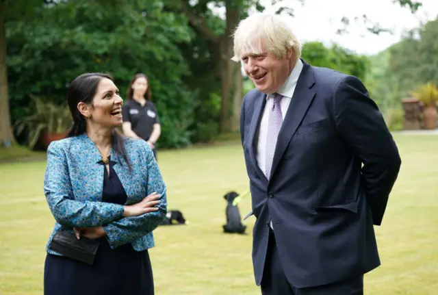 Priti Patel and Boris Johnson visited Surrey Police headquarters in July