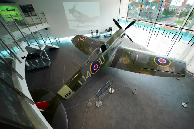 A reconditioned Spitfire is unveiled as the new centre-piece of the Potteries Museum And Art Gallery in Stoke-on-Trent