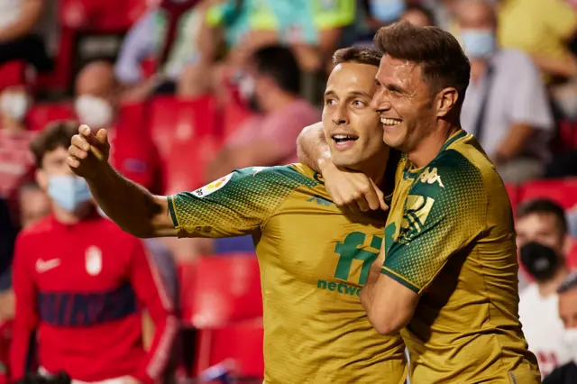 Sergio Canales of Real Betis celebrates after scoring his team's second goal during the LaLiga Santander match between Granada CF and Real Betis