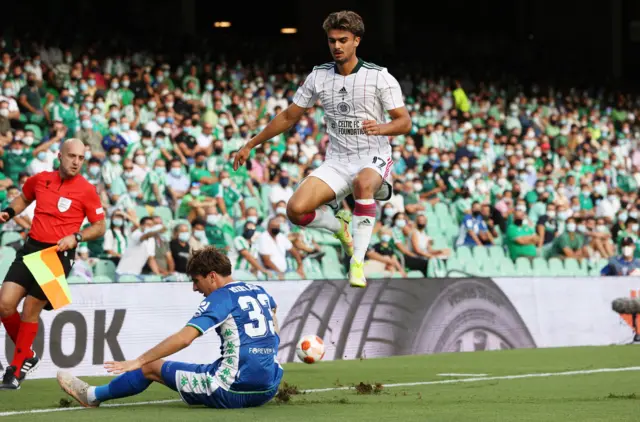 Betis' Juan Miranda (left) tackles Celtic's Jota during a UEFA Europa League match between Real Betis and Celtic