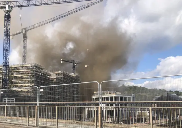 Smoke billowing from the new development on Durham's riverside