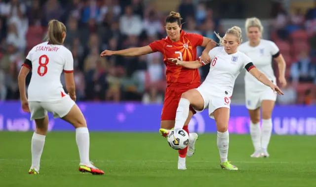 Alex Greenwood of England battles for possession with Gentjana Rochi