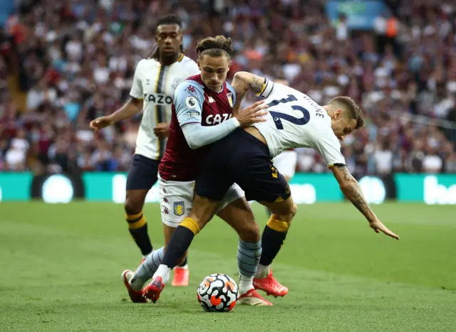 Aston Villa's Matty Cash in action with Everton's Lucas Digne