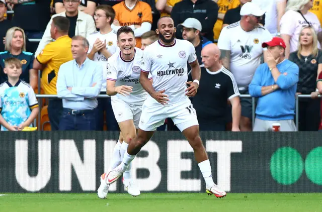 Bryan Mbeumo of Brentford celebrates scoring his teams second goal against Wolves