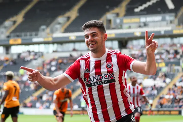 John Egan celebrates