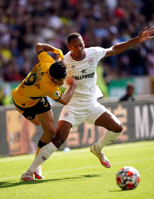 Brentford's Ethan Pinnock (right) and Wolverhampton Wanderers' Raul Jimenez battle for the ball