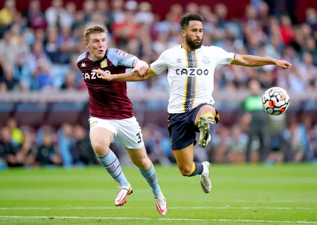 Aston Villa's Matt Targett (left) and Everton's Andros Townsend battle for the ball