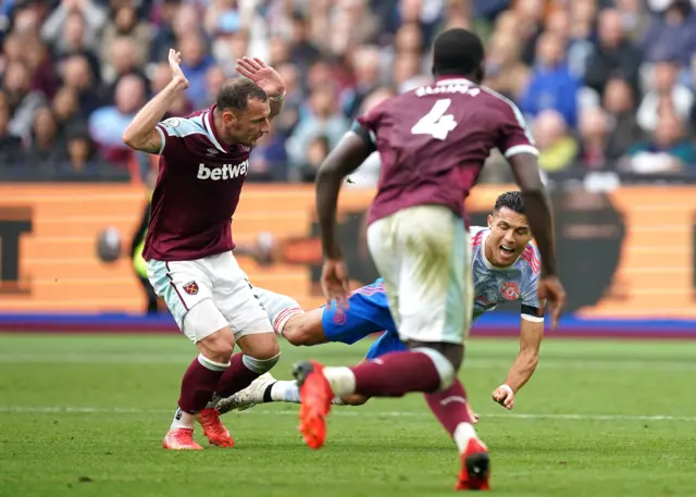 Cristiano Ronaldo goes down in the penalty area