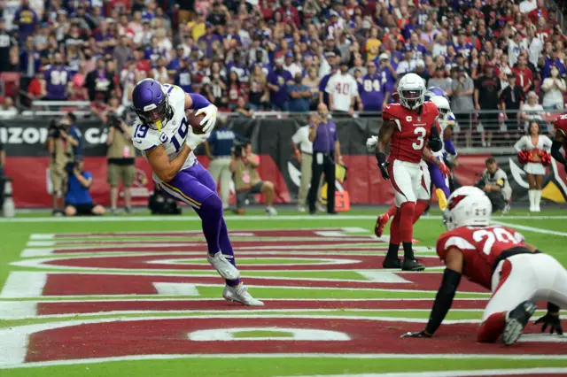 Adam Thielen celebrates a touchdown for the Minnesota Vikings