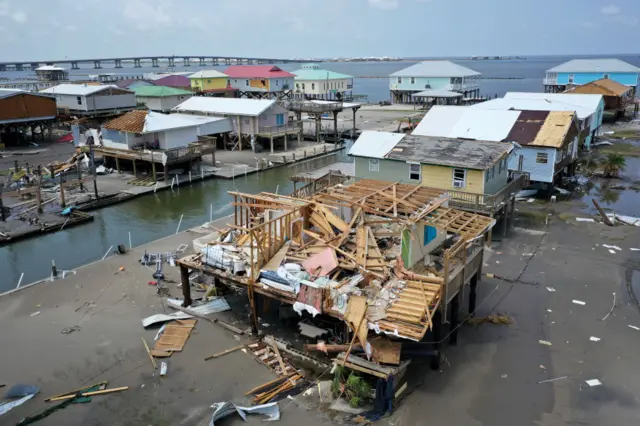 destroyed homes in Grand Isle, Louisiana, where the storm made landfall