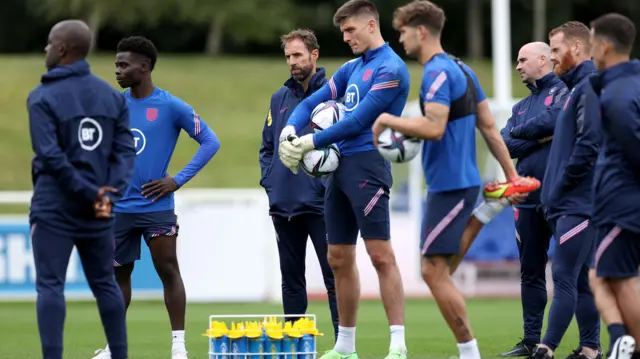 Gareth Southgate (centre) amongst some England players