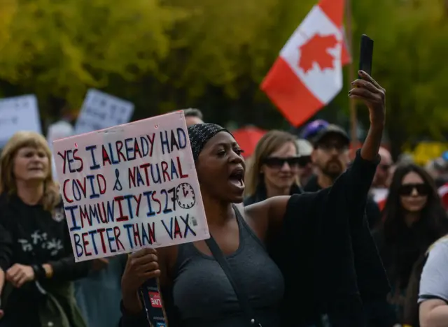 Hundreds attend a protest on 18 September in Edmonton, Alberta