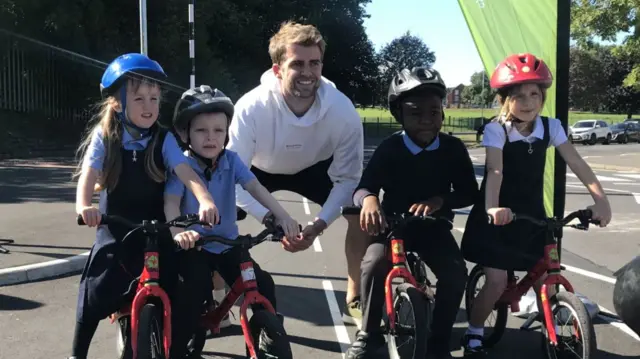 Patrick Bamford with pupils from Saint Luke's C of E Primary School.