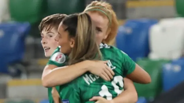 Louise McDaniel celebrates scoring Northern Ire;and's opening goal