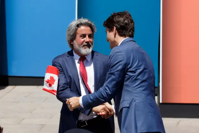 Canadian Prime Minister Justin Trudeau greets Minister of Canadian Heritage and Multiculturalism Pablo Rodriguez during Canada Day ceremonies at Parliament Hill on July 01, 2019