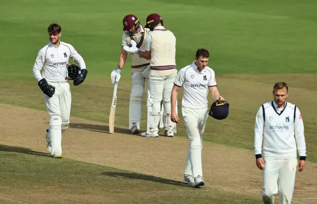 Warwickshire bowlers looking sad