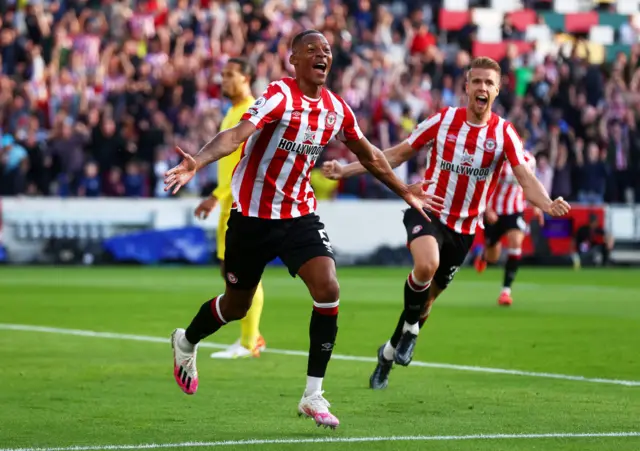 Ethan Pinnock celebrates his goal against Liverpool