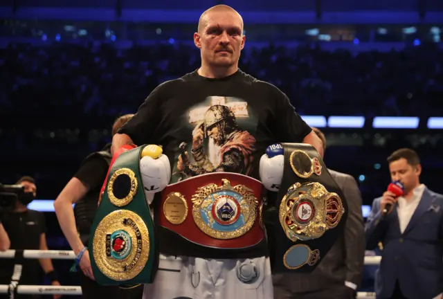 Oleksandr Usyk with is belts