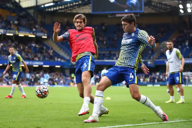 Marcos Alonso and Andreas Christensen warming up for Chelsea