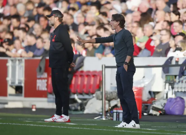 Manager Thomas Frank and Jurgen Klopp on the sideline