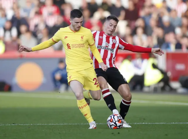 Andy Robertson in action against Brentford