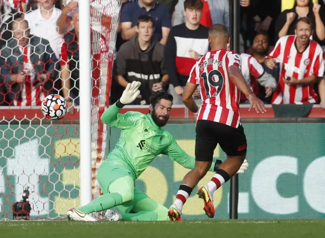 Bryan Mbeumo sees his shot cleared off the line