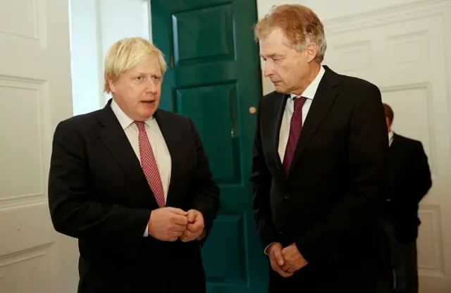 Ambassador Ammon with Boris Johnson in 2016.