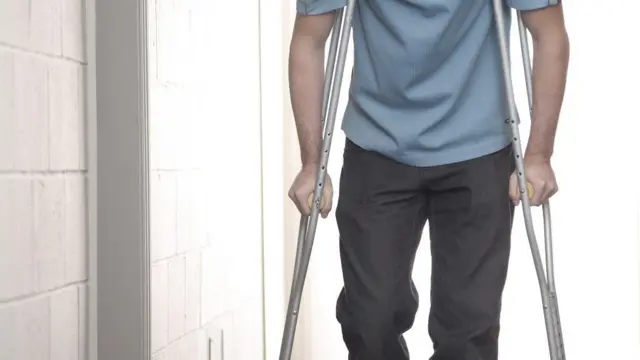 A man on crutches