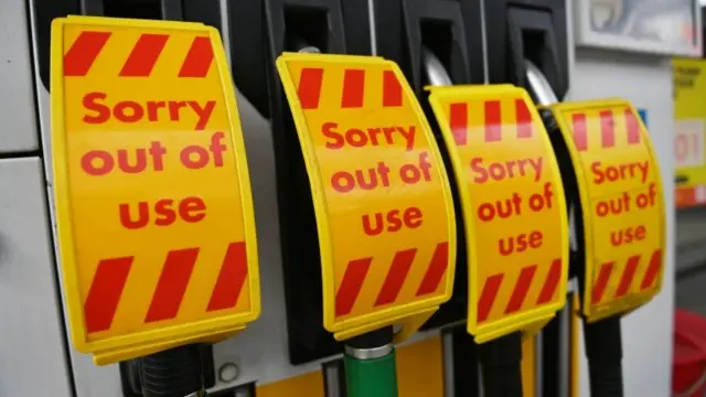 Sold out signs on petrol pumps