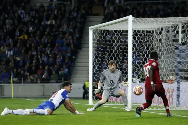 Liverpool's Sadio Mane shoots at Porto goalkeeper Iker Casillas