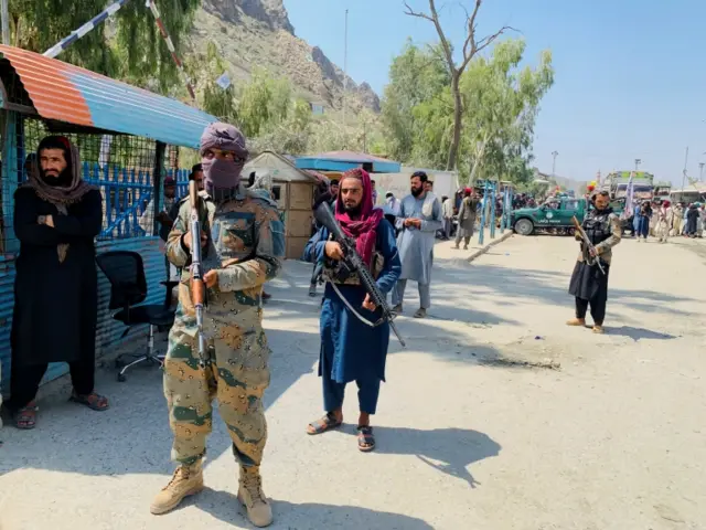 Members of the Taliban force stand guard, during an organised media tour to the Pakistan-Afghanistan crossing border, in Torkham, Pakistan September 2, 2021