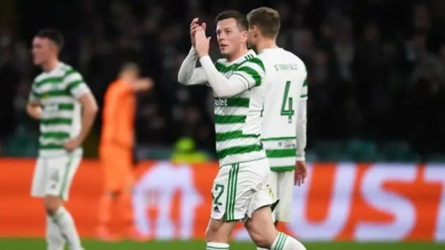 Celtic captain Callum McGregor applauds the fans