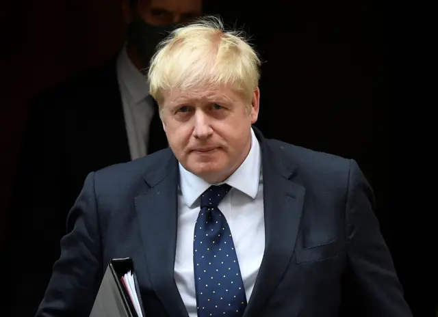 Britain's Prime Minister Boris Johnson leaves Downing Street, ahead of addressing lawmakers about Britain"s withdrawal from Afghanistan, in London, Britain, September 6, 2021.