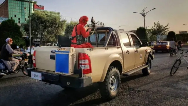 A Taliban figher on patrol in Herat