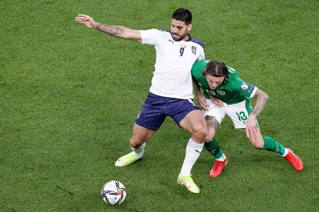 Serbia's Aleksandar Mitrovic and Jeff Hendrick of the Republic of Ireland