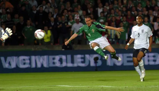 David Healy scores against England