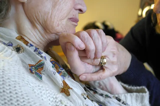 A woman in a care home