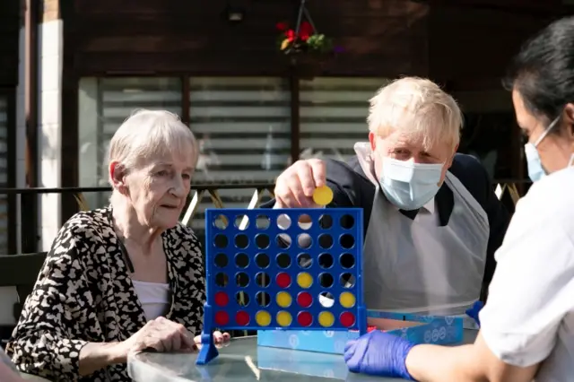 PM at a care home in east London yesterday