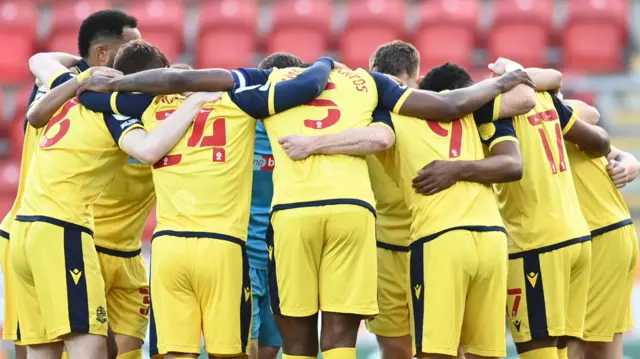 Bolton huddle