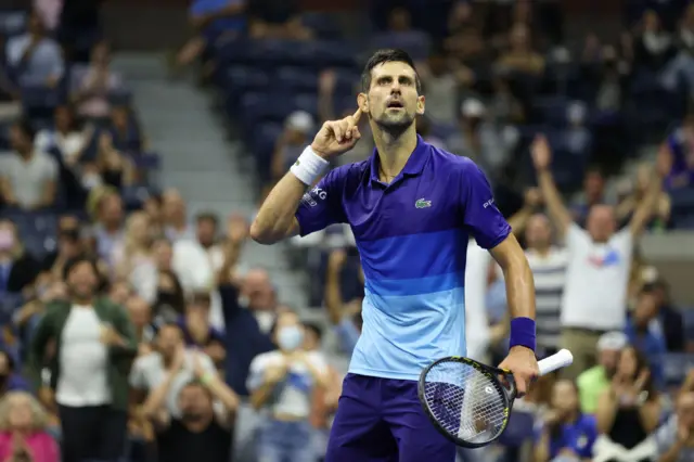 Novak Djokovic reacts to the crowd during a match at the 2021 US Open