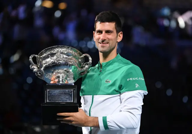 Novak Djokovic with the Australian Open trophy in 2021