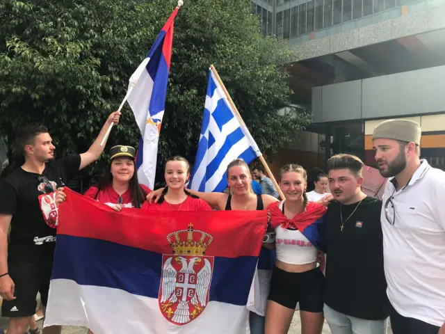 Djokovic supporters outside the court hearing.