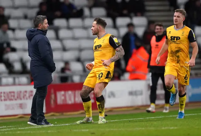 Chris Maguire celebrates