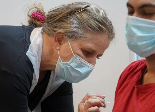 Patient being vaccinated