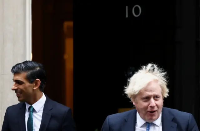 Rishi Sunak and Boris Johnson in Downing Street in December