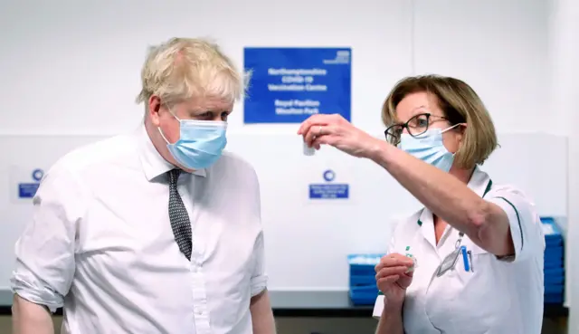 Boris Johnson at a vaccination centre in Northamptonshire on 6 January