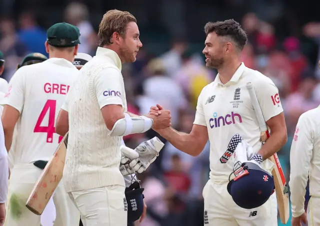 James Anderson and Stuart Broad celebrate England drawing the fourth Ashes Test against Australia in Sydney