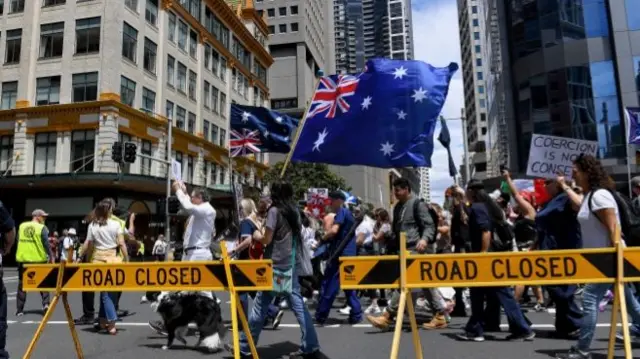 Protesters marching against vaccine mandates in Sydney, Australia