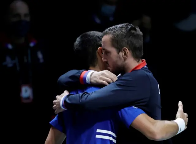 Novak Djokovic (L) of Serbia celebrates his victory against Marin Cilic of Croatia with the team"s captain Viktor Troicki during the semi final Davis Cup tie between Serbia and Croatia held at Madrid Arena tennis complex in Madrid, central Spain, 03 December 2021